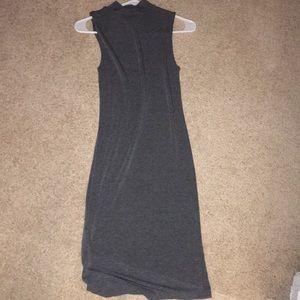 A dark grey slim fitting dress